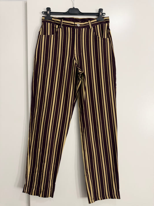 Pantalon raya media vertical con bolsillo