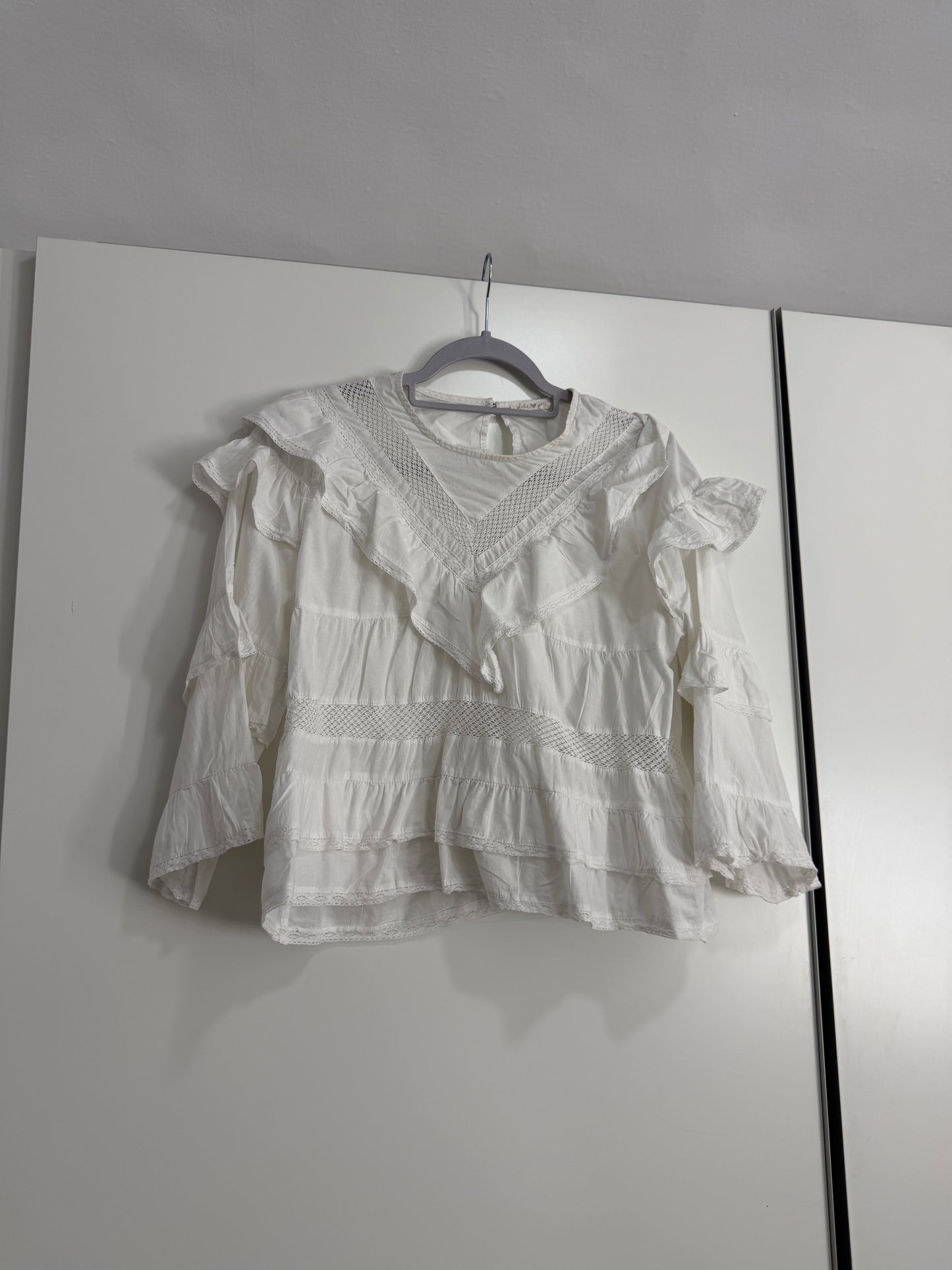 Camisa volantes